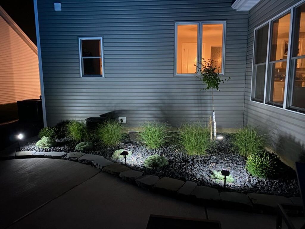 Custom landscaping with outdoor lighting