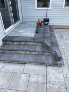 Tiled patio with steps