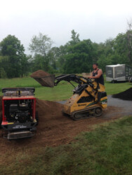 man moving dirt