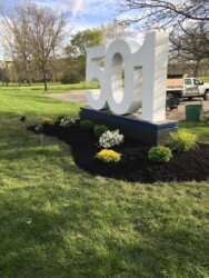 landscape around address sign